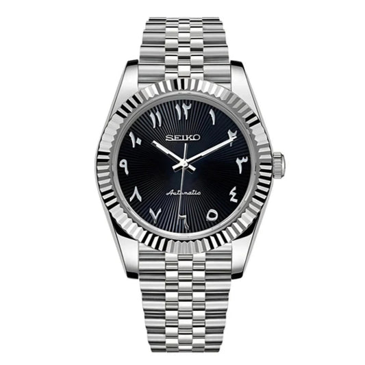 Seiko Mod watch with black face and silver metal strap on white background