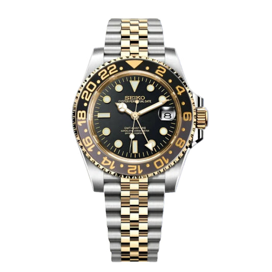 Seiko  mod watch with two-tone metal strap on a white background