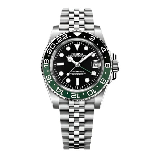 Seiko Mod watch with green bezel and silver bracelet on a white background