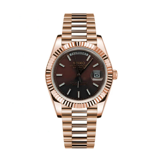 Rose gold Seiko Mod watch with a brown dial on a white background