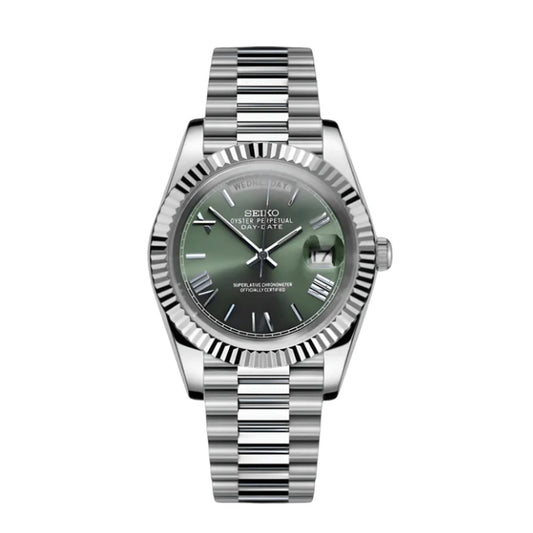 Silver Seiko Mod  watch with a green face on a white background
