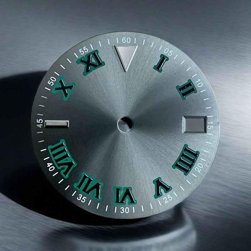Metallic watch dial with Roman numerals on a reflective surface